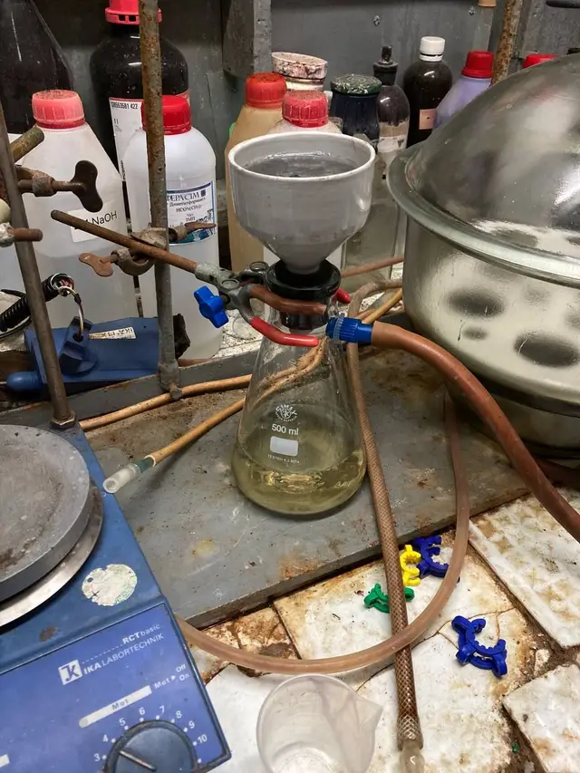 Vacuum filtration setup on a chemistry laboratory bench