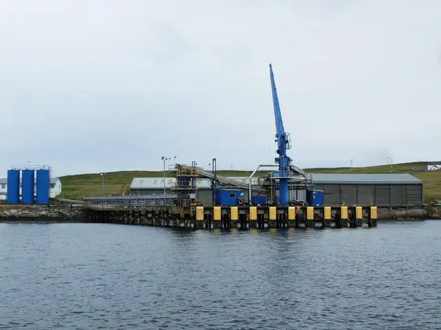Fish meal and oil factory buildings on a harbor